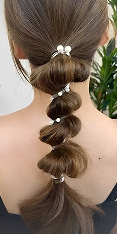 coiffure avec elastique cheveux spirale nacree