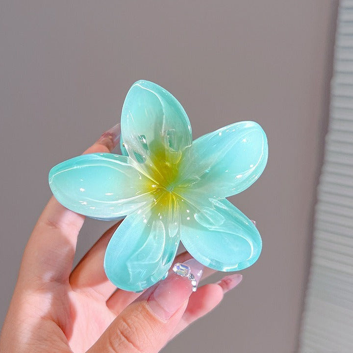 pince a cheveux fleurs bleu verte brillante