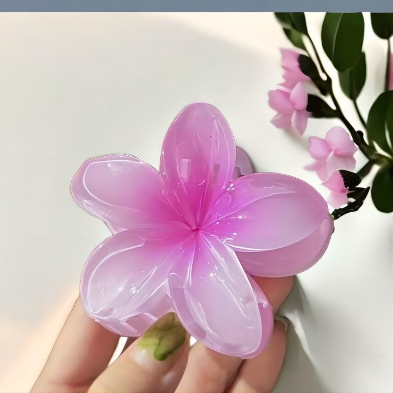 pince a cheveux fleurs rose brillante