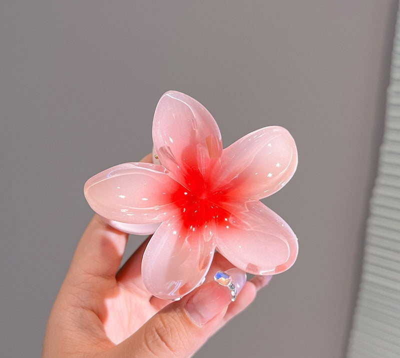 pince a cheveux fleurs rouge brillante