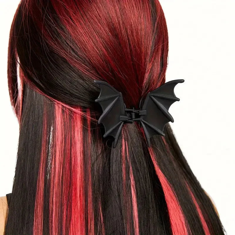 pince chauve souris sur cheveux