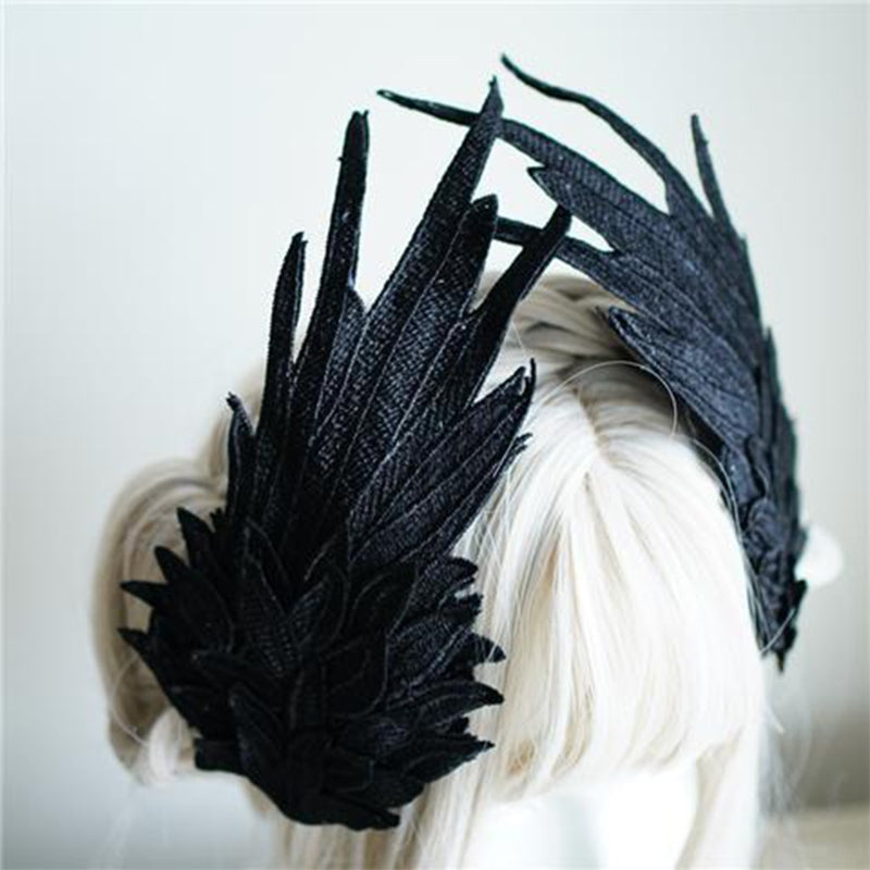 pince cheveux forme aile corbeau