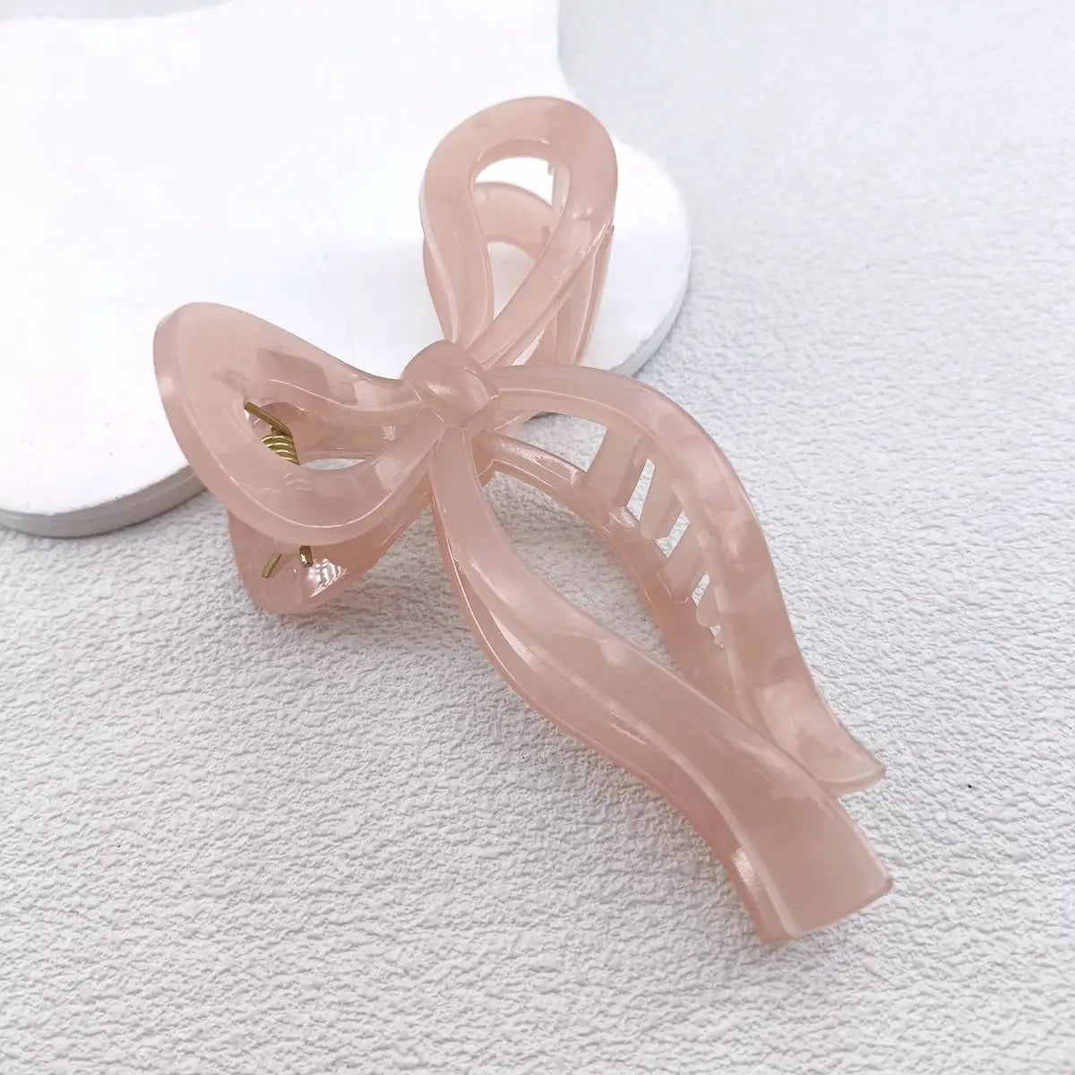 pince cheveux noeuds rose nacre