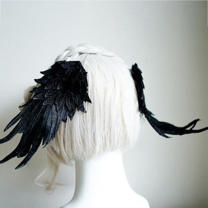 pince cheveux coiffure aile corbeau